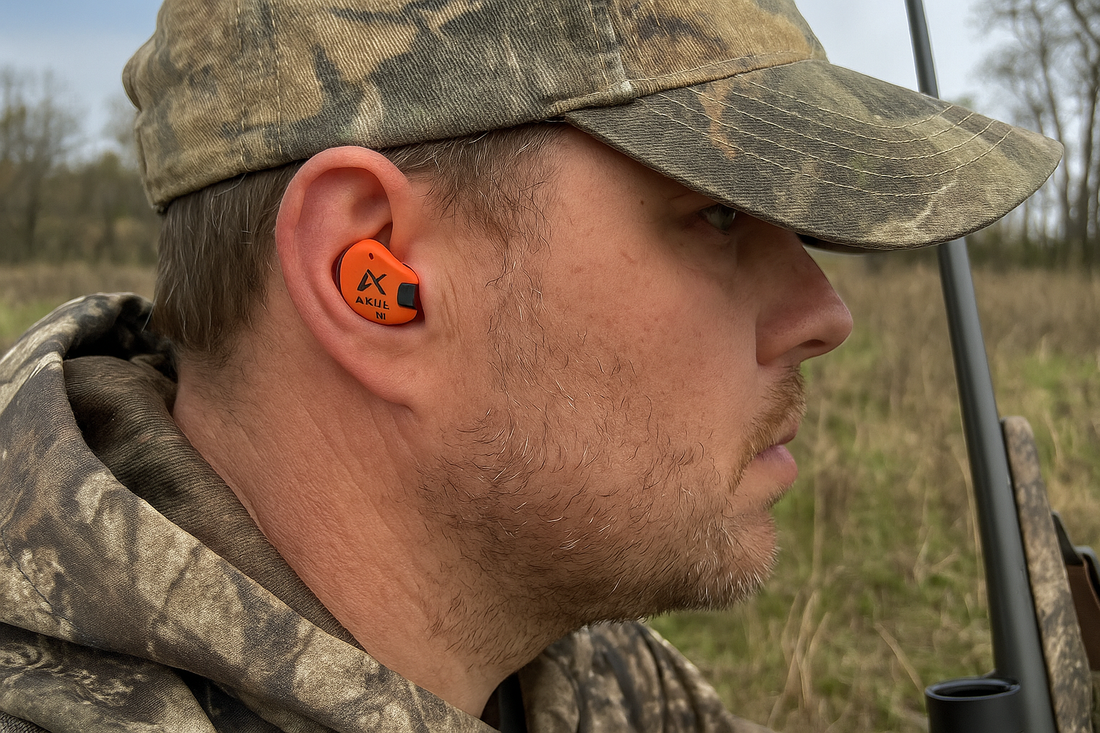 Flat lay of AXIL X30I earplugs with hunting accessories